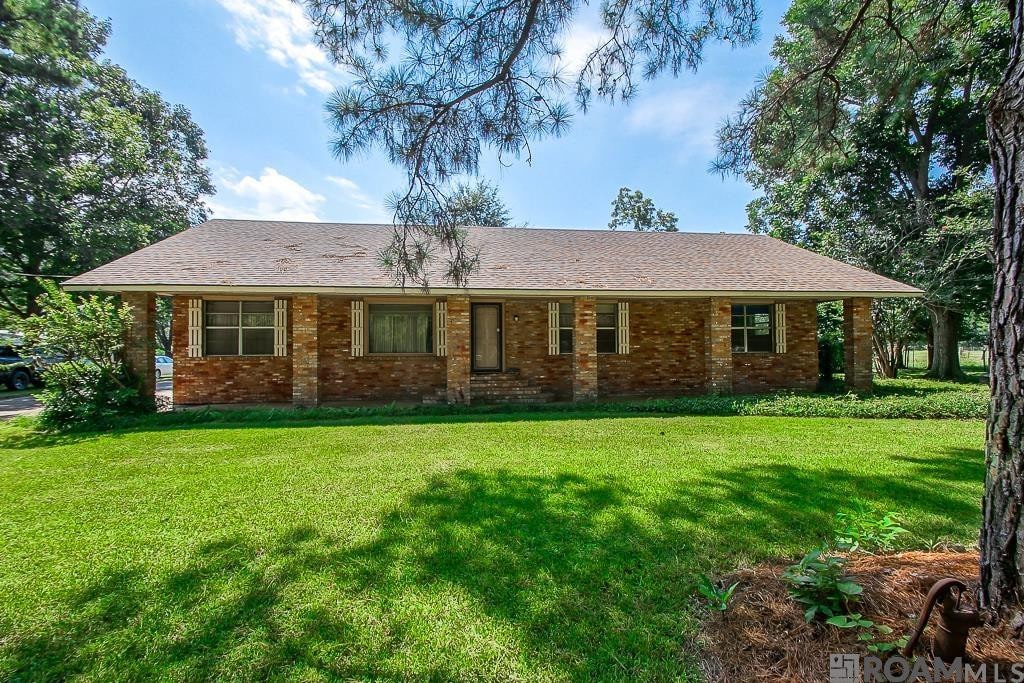 Photo 1 of 21 for 11837 E Subdivision Rd, Port Allen LA 70767